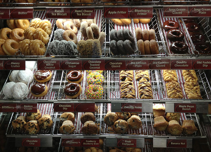 Donuts, muffins and Danishes on display at a Tim Hortons location in Oakville, Ont., Friday, April 26, 2013. 