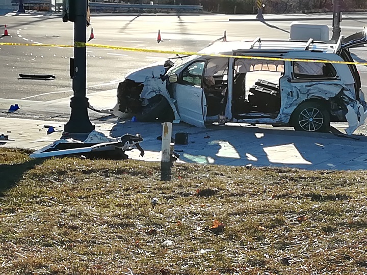 A 78-year-old man who was an occupant of this white minivan was transported to hospital in life-threatening condition.