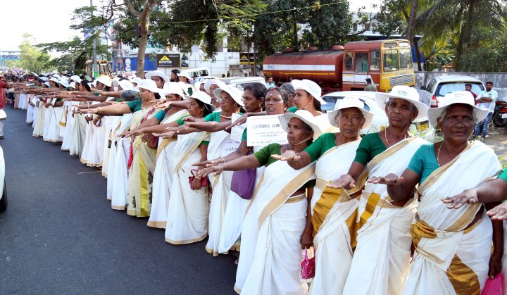Indian women rise their hands as they pledge to protect the renaissance values and gender equality while participating in the ‘Women’s Wall’ in Kochi, India, 01 January 2019.
