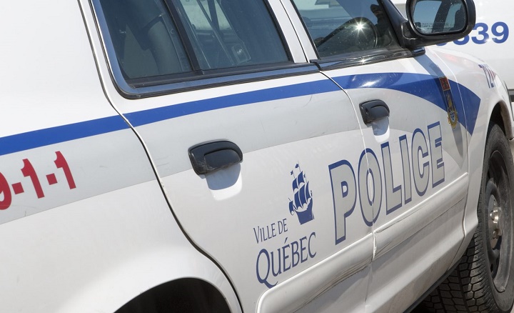 Ville de Quebec city police logo is seen on a police car.