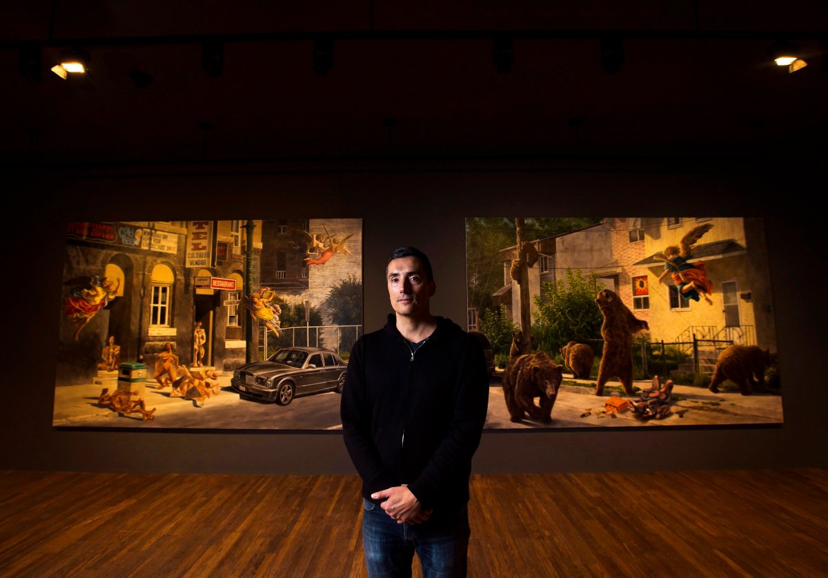 Cree artist Kent Monkman poses for a photograph at his new exhibition "Shame and Prejudice: A Story of Resilience.".