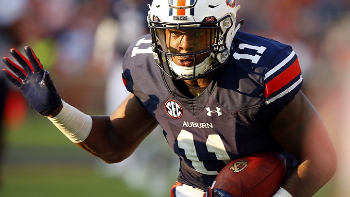 In this Sept. 16, 2017, file photo, Auburn wide receiver Kyle Davis (11) carries the ball after a reception during the second half of an NCAA college football game against Mercer in Auburn, Ala.