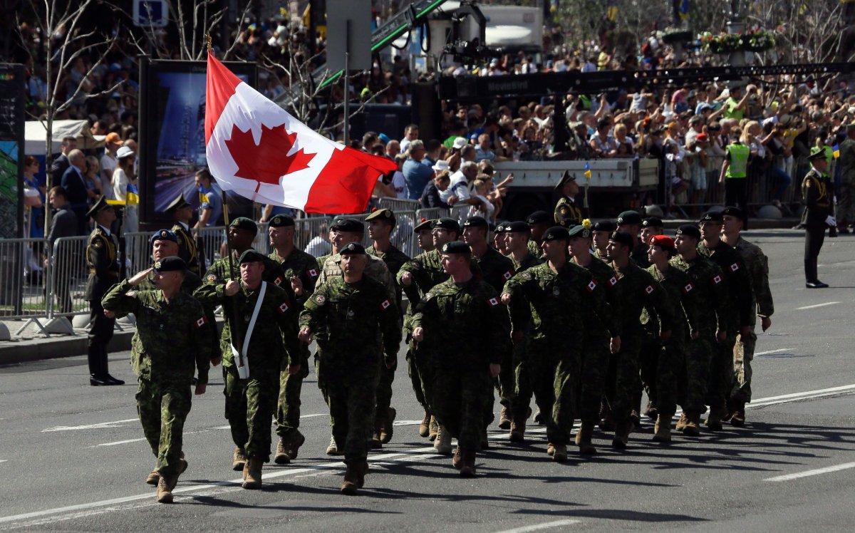 Canada's soldiers march along main Khreshchatyk Street during a military parade to celebrate Independence Day in Kiev, Ukraine, Aug. 24, 2018. 