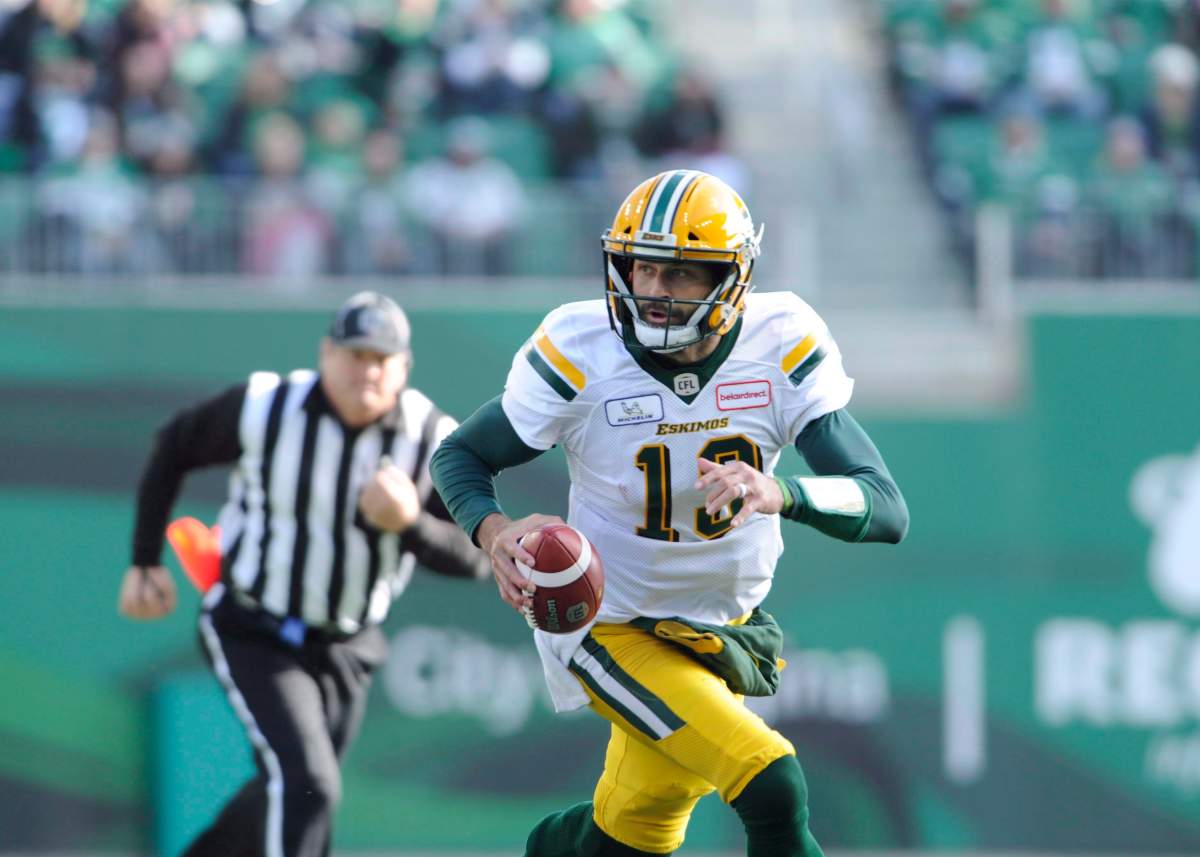 Edmonton Eskimos quarterback Mike Reilly runs the ball during first half CFL action against the Saskatchewan Roughriders, in Regina on Monday, Oct. 8, 2018.