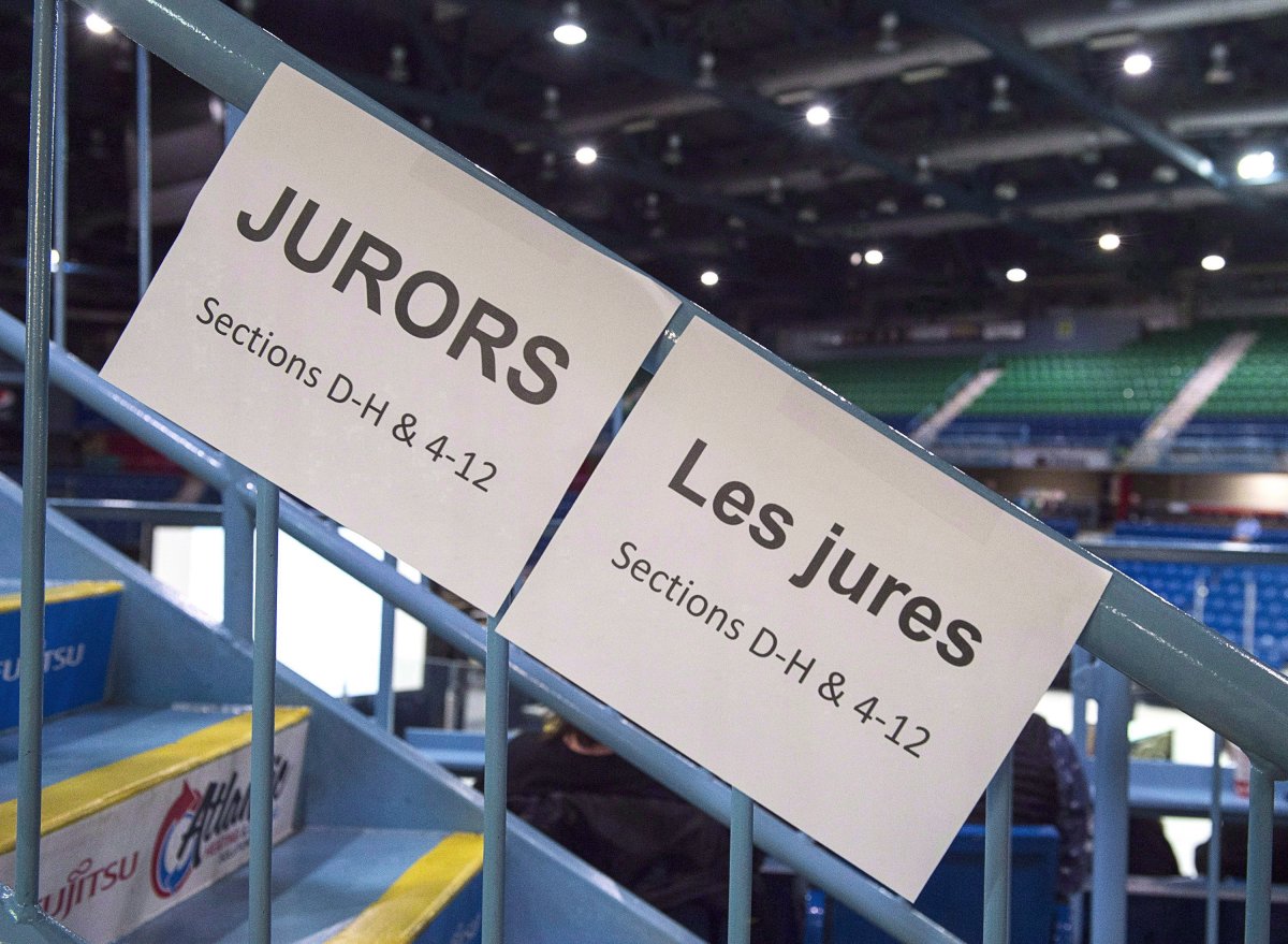 Signage directs potential jurors at jury selection for the retrial of Dennis Oland in the bludgeoning death of his millionaire father, Richard Oland, at Harbour Station arena in Saint John, N.B., Oct. 15, 2018. 


