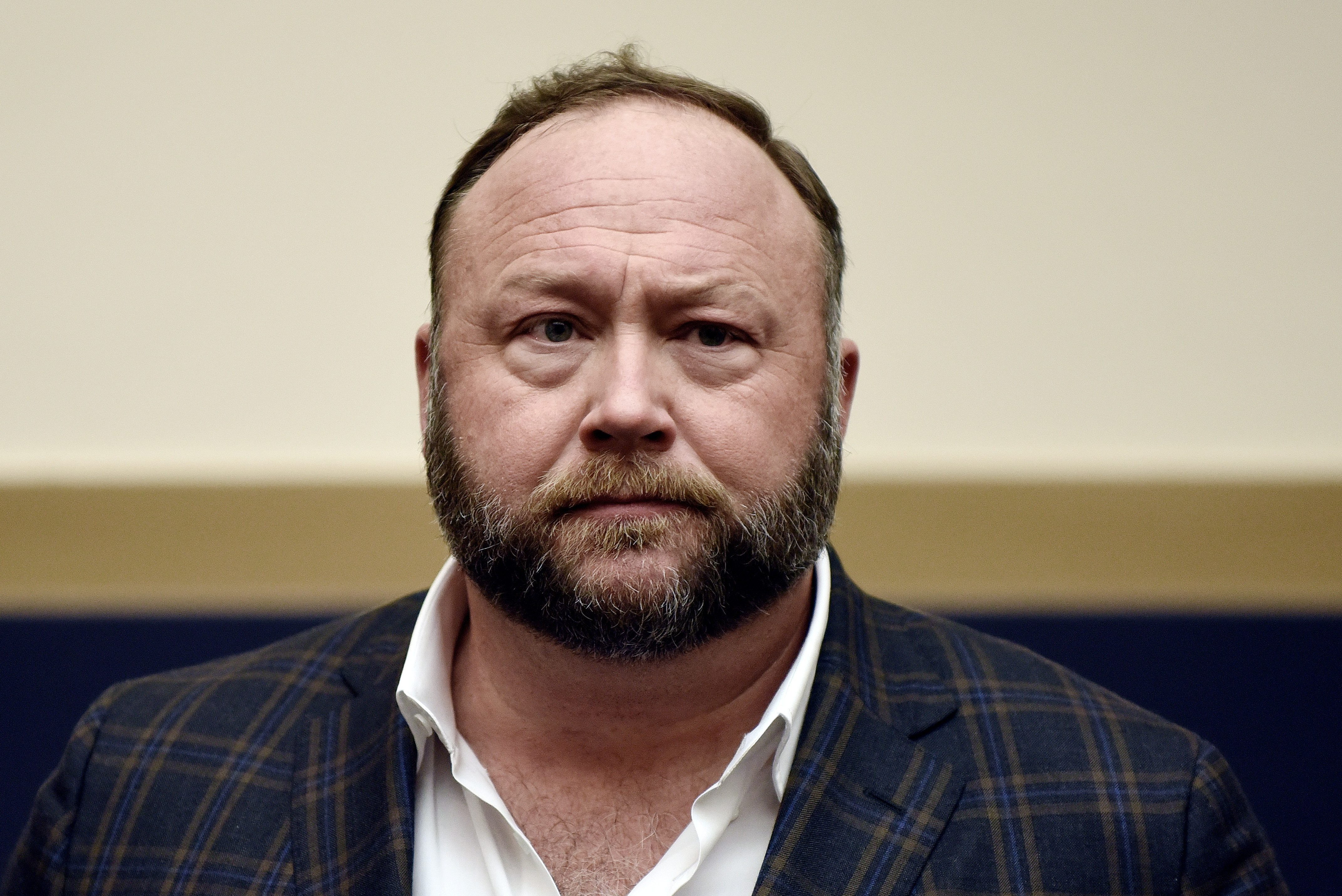 Infowars founder Alex Jones attends Google CEO Sundar Pichai's hearing before the House Judiciary committee on Capitol Hill December 11, 2018 in Washington, DC. 