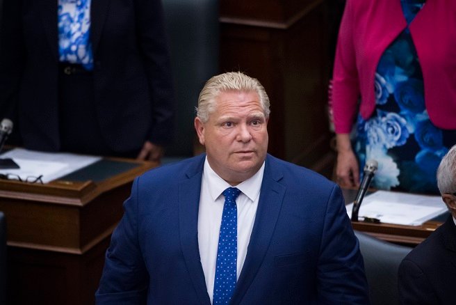 Ontario Premier Doug Ford is photographed as Her Honour the Honourable Elizabeth Dowdeswell, Lieutenant Governor of Ontario, delivered the Speech from the Throne in the main chamber in the Ontario Legislature on Thursday, July 12, 2018. 