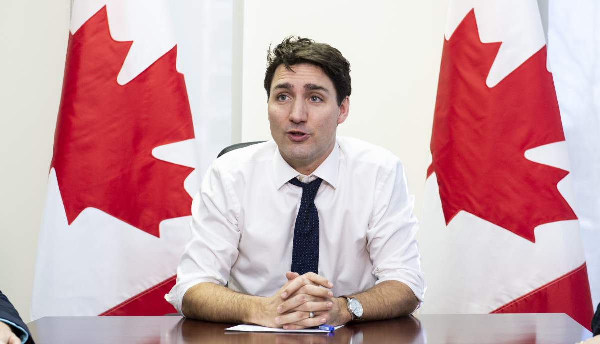Prime Minister Justin Trudeau delivers remarks prior to a meeting with elected members of a borough in his riding in Montreal, Feb. 1, 2019. 