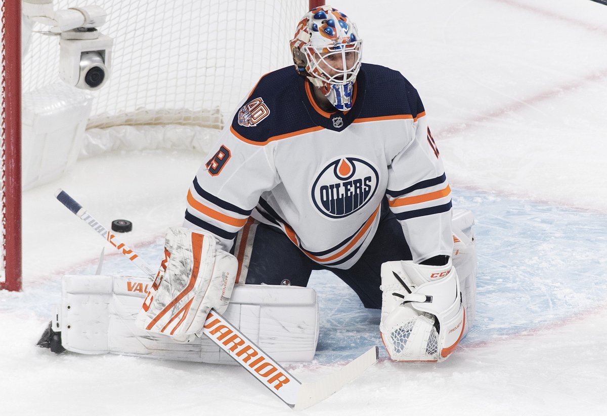 Edmonton Oilers goaltender Mikko Koskinen reacts after a goal by Montreal Canadiens' Shea Weber during first period NHL hockey action in Montreal, Sunday, February 3, 2019. 