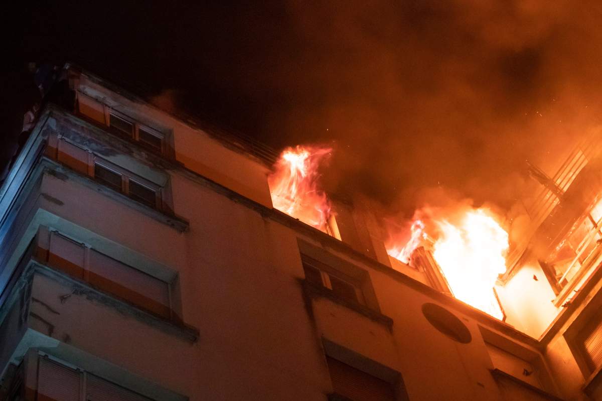 The Paris fire service says 10 people have been killed and at least 28 injured in a fire in a residential building.