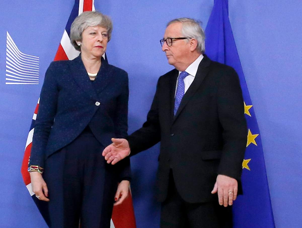 British Prime Minister Theresa May (L) is welcomed by European commission President Jean-Claude Juncker (R) ahead to a meeting on Brexit in Brussels, Belgium, 07 February 2019.