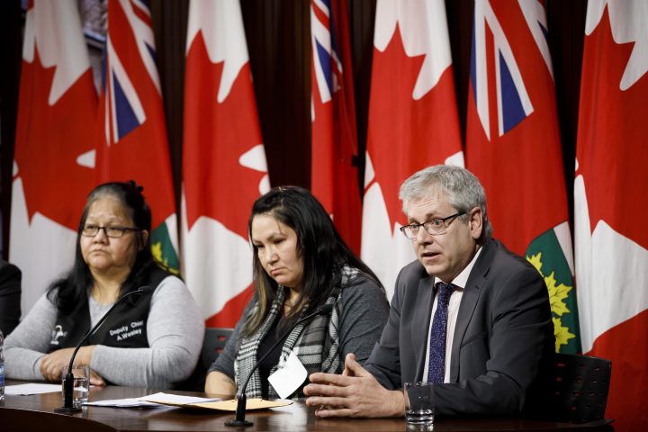 Federal NDP MP Charlie Angus, right, speaks alongside Cat Lake First Nation councillor Joyce Cook, centre, and Cat Lake First Nation deputy chief Abigail Wesley, left, during a press conference at Queen’s Park in Toronto on Friday, Feb. 15, 2019.