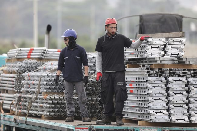 Workers begin to build the stage for an upcoming concert coined: “Concert for the freedom of Venezuela” on the Colombian side of the Tienditas International Bridge on the outskirts of Cucuta, Colombia, on the border with Venezuela, Monday, Feb. 18, 2019.