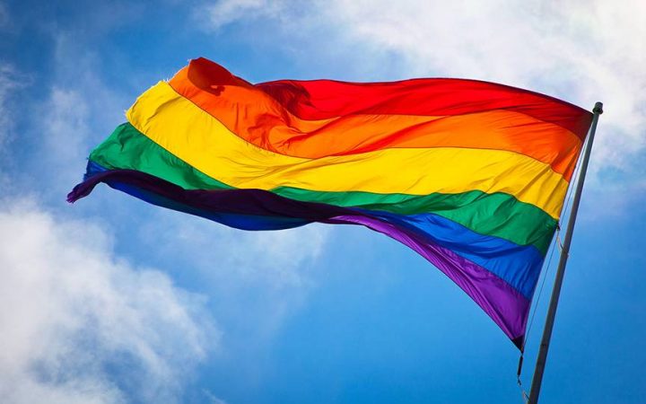 A rainbow flag representing the universal symbol for LGTBQ-Identified persons across the world.