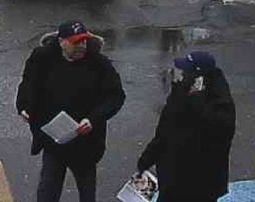 Police are looking to identify these two men after a defibrillator was stolen from the Beveridge Arts Centre at Acadia University. 