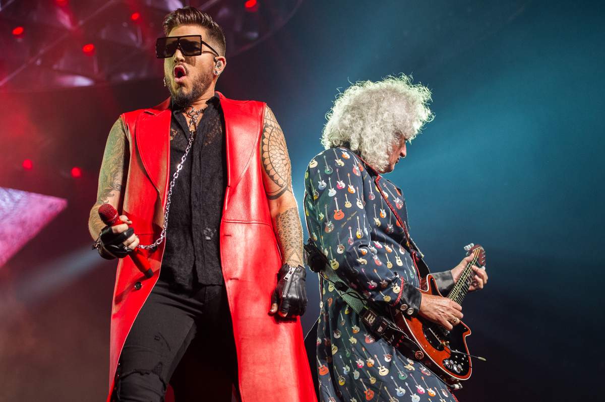 Adam Lambert (L) and Brian May of Queen and Adam Lambert perform live on stage at The O2 Arena on July 2, 2018, in London, England.