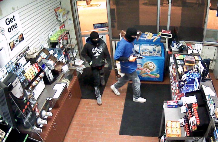 RCMP are trying to identify two masked suspects after an armed robbery at a store in Battleford, Sask.