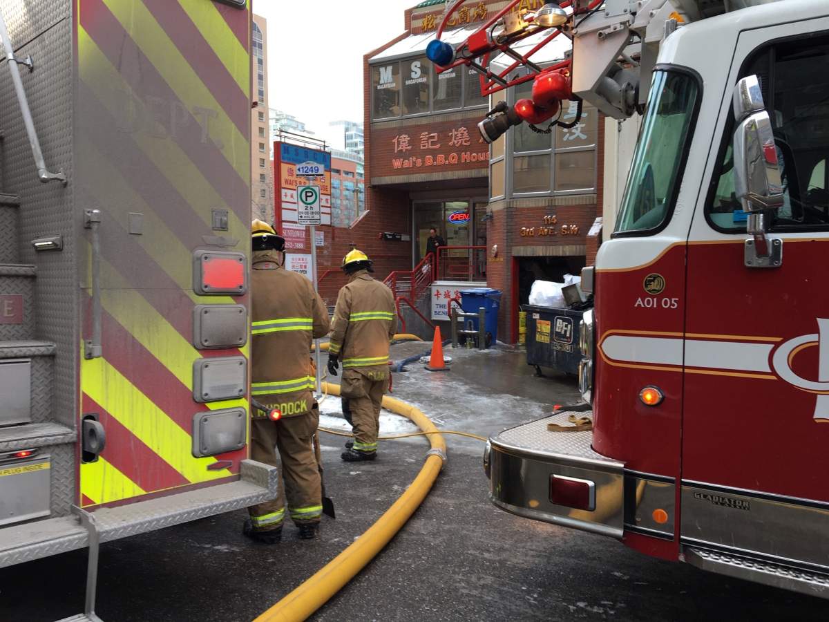 Calgary firefighters investigate a flooding call at 114 3 Avenue S.W. on Feb. 4, 2019.