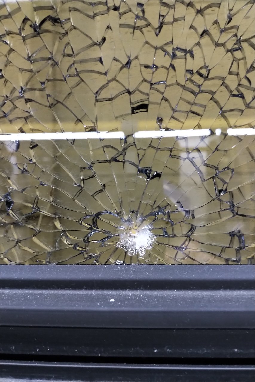 The City of Kingston provide this photo of the damage done to one of the three windows allegedly shot by a Kingston man over the weekend.