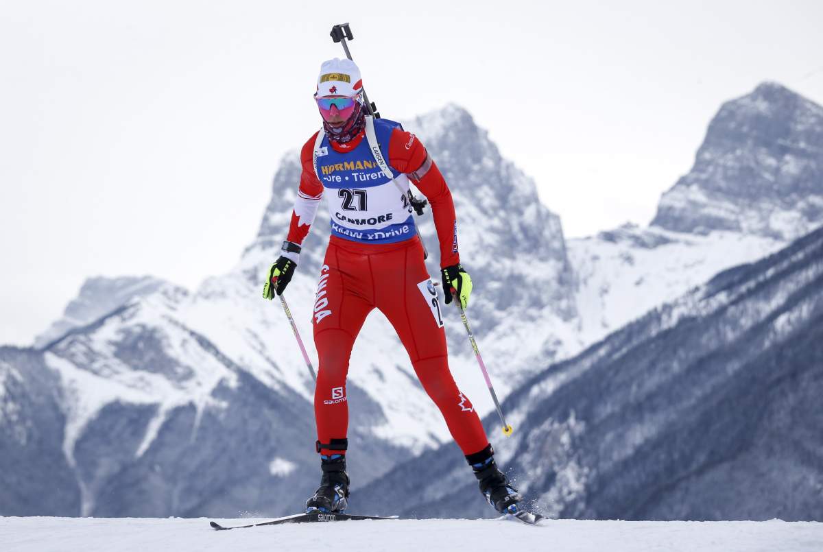 Arctic temperatures in Alberta have forced organizers to cancel competition at the biathlon World Cup. Canada's Rosanna Crawford skis during World Cup biathlon women's short 12.5 km event in Canmore, Alta., Thursday, Feb. 7, 2019. 