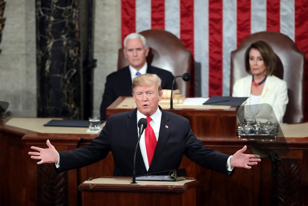 President Donald Trump delivers his State of the Union address to a joint session of Congress on Capitol Hill in Washington, as Vice President Mike Pence and Speaker of the House Nancy Pelosi, D-Calif., watch, Tuesday, Feb. 5, 2019.