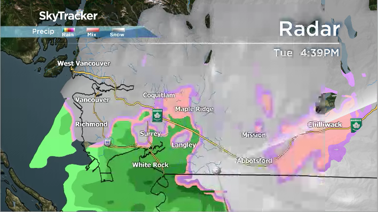 Radar imagery showing the areas where snow is falling in white versus the rain in green