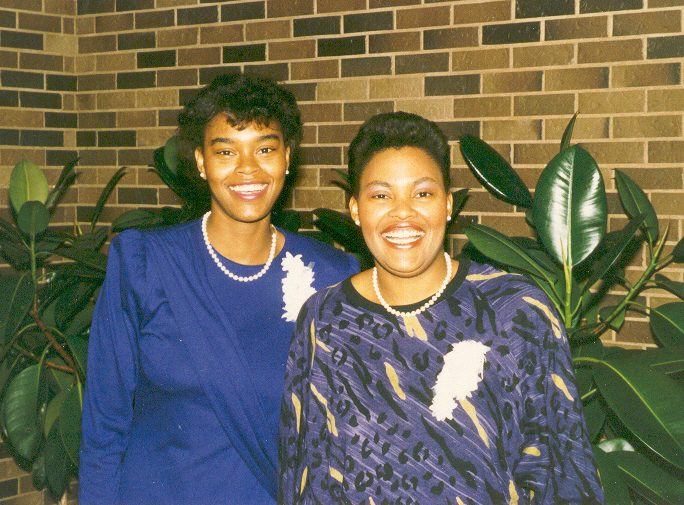 Charmaine Lawrence, left, with her sister Andrea Lawrence, the first black woman Mountie.
