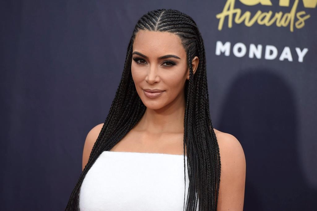 Kim Kardashian arrives at the MTV Movie and TV Awards at the Barker Hangar on Saturday, June 16, 2018, in Santa Monica, Calif.