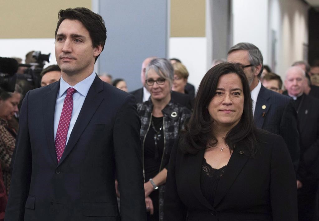 Prime Minister Justin Trudeau and Minister of Justice and Attorney General of Canada Jody Wilson-Raybould take part in the grand entrance as the final report of the Truth and Reconciliation commission is released, Tuesday December 15, 2015 in Ottawa.