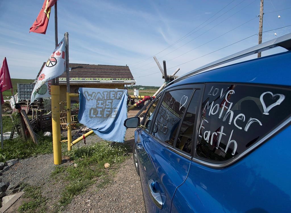 Protesters maintain a Mi'kmaq encampment near the Shubenacadie River, a 72-kilometre tidal river that cuts through the middle of Nova Scotia and flows into the Bay of Fundy, in Fort Ellis, N.S. on Tuesday, July 31, 2018.