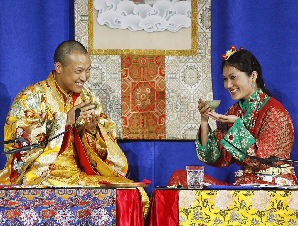 Sakyong Mipham Rinpoche, left, and his bride Princess Tseyang Palmo smile during their Tibetan Buddhist royal wedding ceremony in Halifax on June 10, 2006.