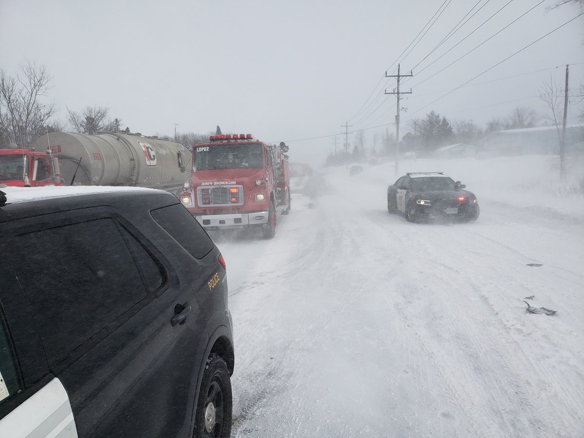 Whiteout conditions caused by high winds and blowing snow caused several roads to close in the city on Monday.
