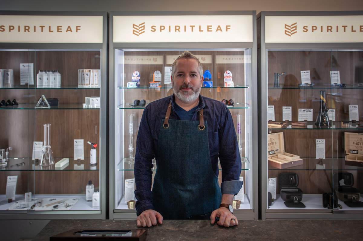 CEO of Spiritleaf Darren Bondar stands at a Calgary retail store. The company has applied to open a retail location in Kingston.