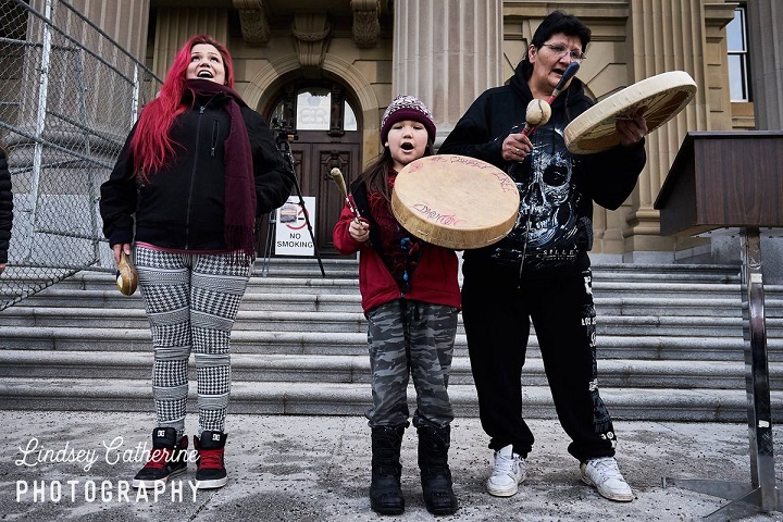 Chubby Cree performs at the Edmonton Women's Anniversary March in January 2018.