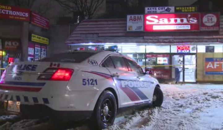 Police investigate a shooting at Sherbourne and Dundas streets in Toronto on Feb. 13, 2019.