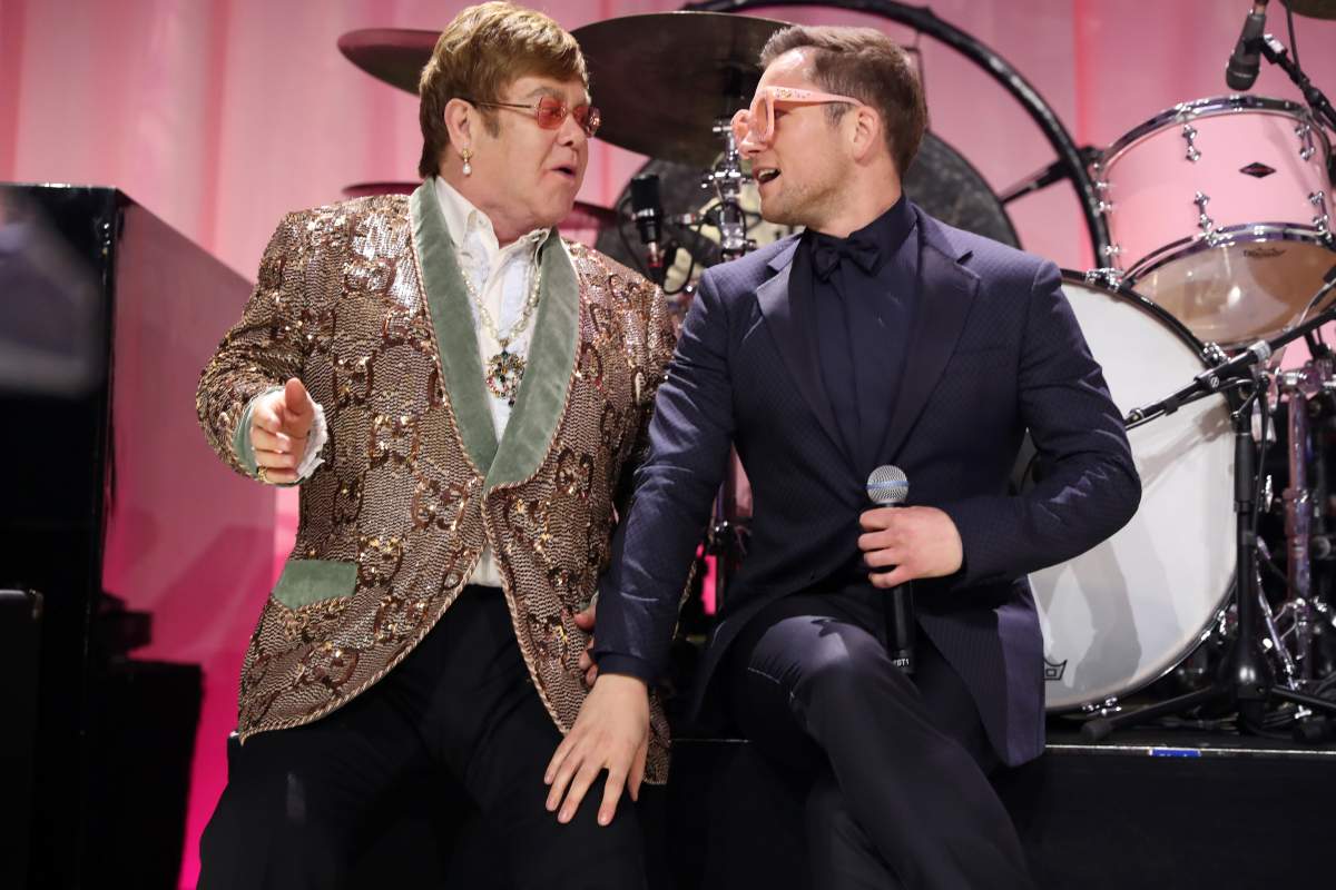 Sir Elton John and Taron Egerton perform onstage during the 27th annual Elton John AIDS Foundation Academy Awards Viewing Party on Feb. 24, 2019, in West Hollywood, Calif.