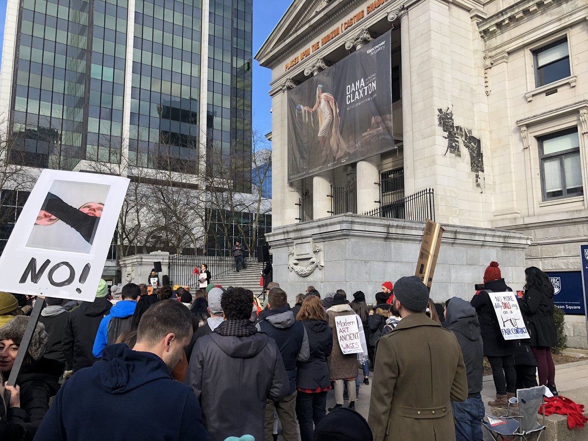 Striking art gallery workers rally outside of the Vancouver Art Gallery on Saturday.