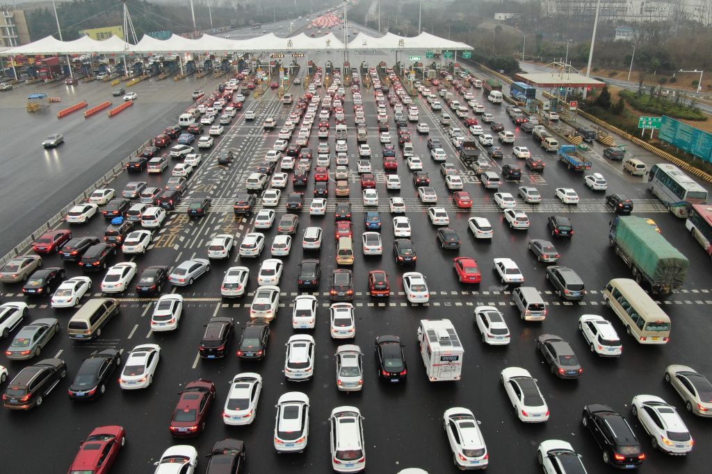 Aerial view of vehicles queuing at a toll station during 2019 Chinese Spring Festival travel rush on January 30, 2019 in Nanjing, Jiangsu Province of China. The 40-day Chinese Spring Festival travel rush starts from January 21 and lasts until March 1.