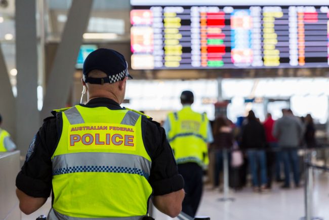 Australian Federal Police are seen at Sydney Airport in this July 30, 2017 file photo. RCMP say they arrested two men who conspired to import cocaine into Sydney, with the help of information from Australian police.