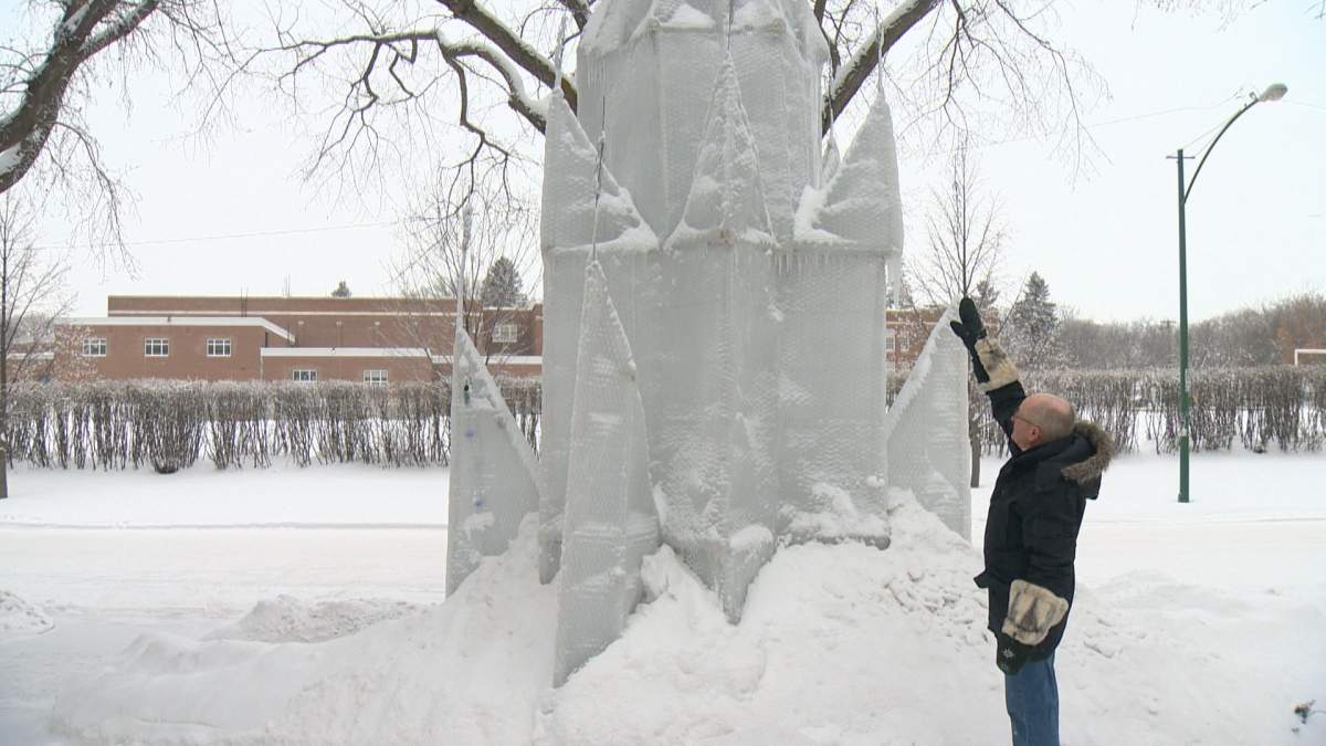 Don Greer stands in front of his ice castle.