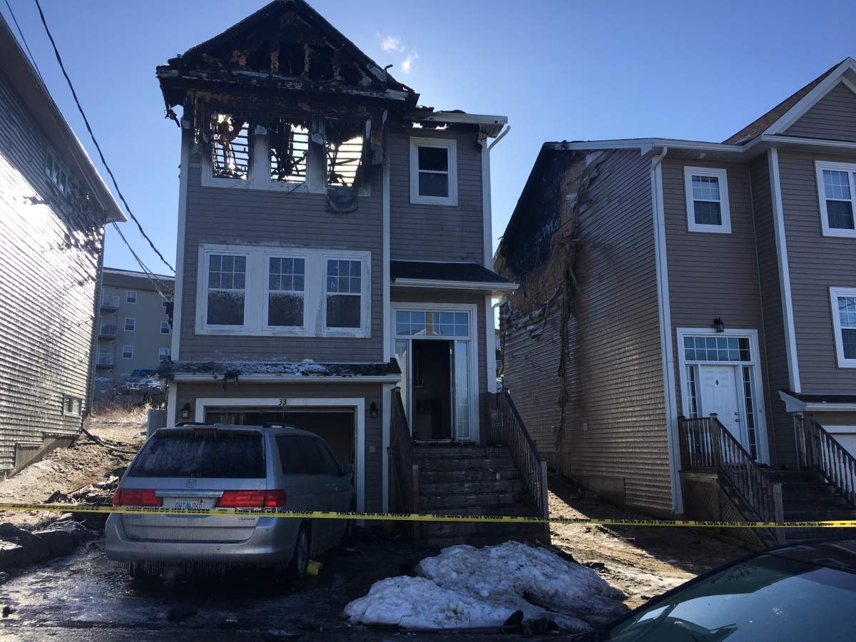 A neighbour next door describes hearing a loud bang prior to the fire.