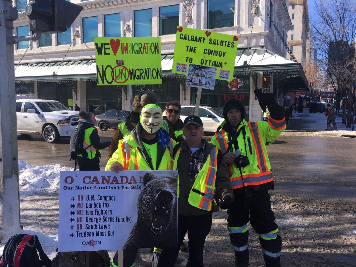 Yellow Vest protesters rally outside Calgary city hall on Tuesday in support of the truck convoy that arrived in Ottawa the same day.