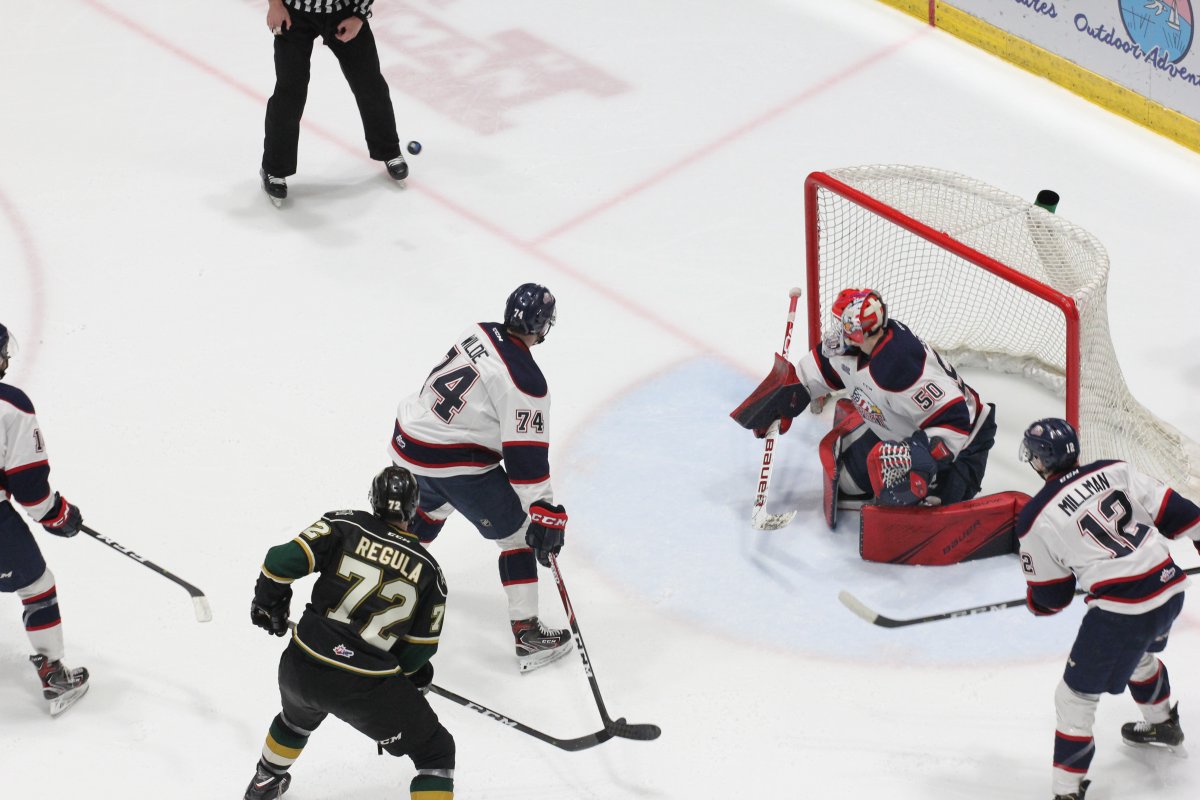 Saginaw, Mich. - Ivan Prosvetov makes one of his 55 saves in a 6-3 win over the London Knights on February 9, 2019.