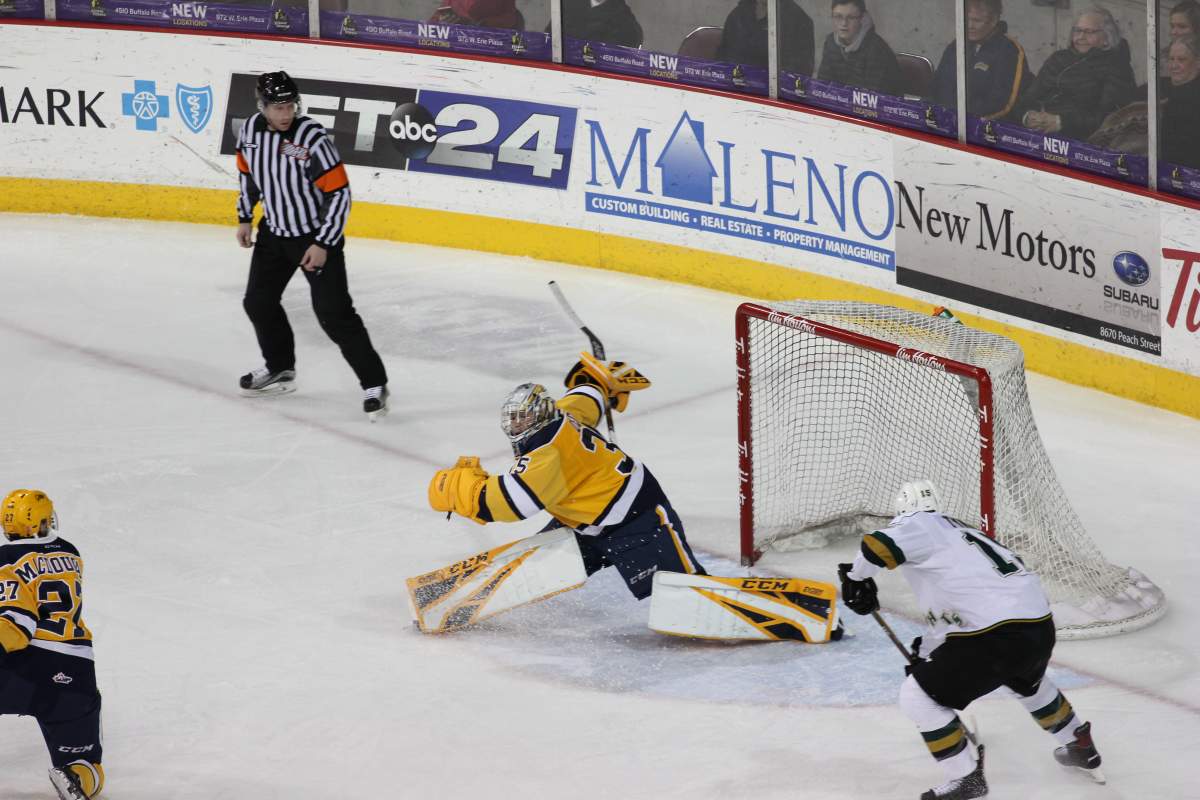 Erie, PA - Cole Tymkin of the London Knights slides his 20th goal of the season into the Erie Otters' net in an 8-3 London win on February 17, 2019.