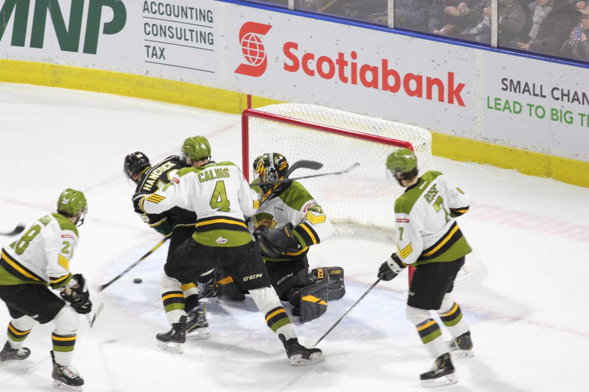 Kevin Hancock fights his way to his 48th goal of the season on Feb. 24, 2019.