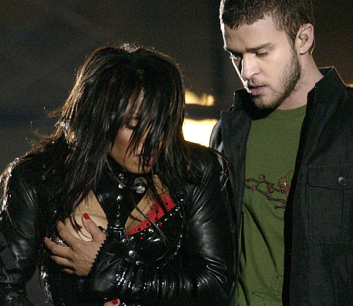 In this Sunday Feb. 1, 2004 file photo, Janet Jackson, covers her breast after her outfit came undone during the half time performance with Justin Timberlake at Super Bowl XXXVIII in Houston.