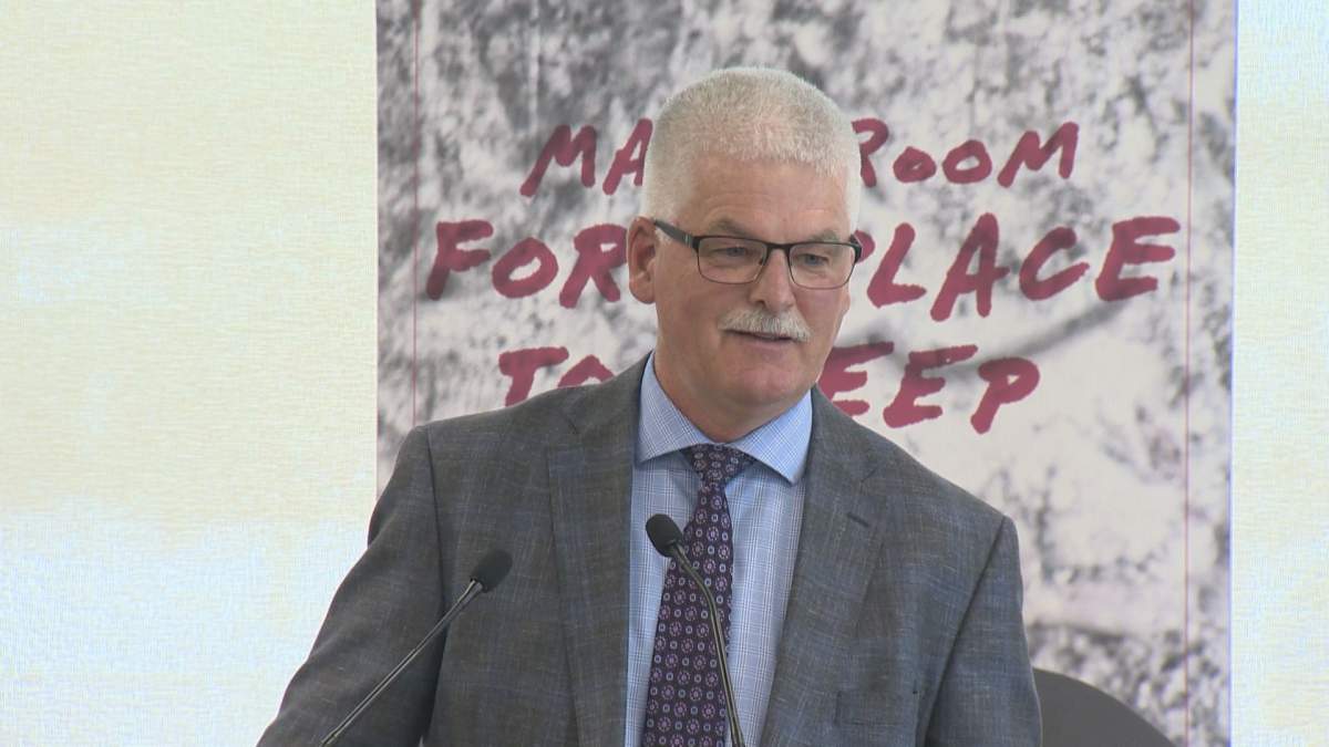 Siloam Mission CEO Jim Bell speaks to donors and media about progress on his shelter's expansion.