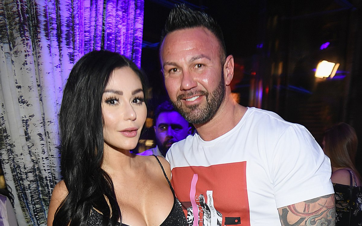 Television personality Jenni 'JWoww' Farley (L) and Roger Mathews attend MTV's 'Jersey Shore Family Vacation' New York premiere party at PHD at the Dream Downtown on April 4, 2018 in New York City.