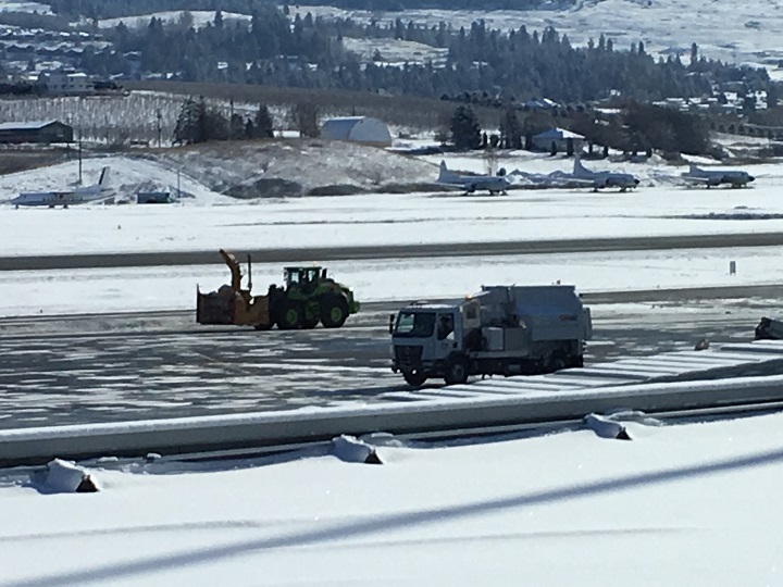 Clearing snow from Kelowna International Airport on Wednesday, Feb. 13, 2019.