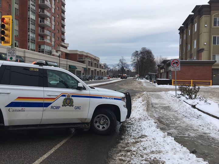 A police cruiser blocks traffic along Bernard Avenue near downtown Kelowna.